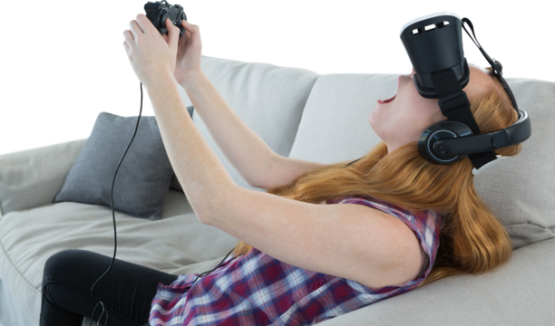 Woman playing video game with virtual reality headset