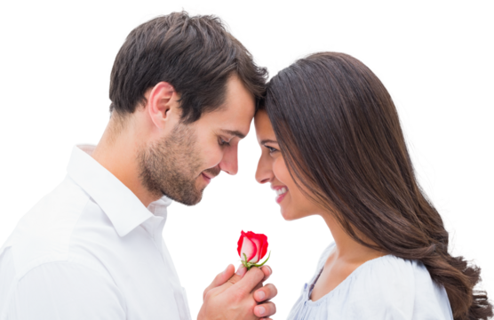 Handsome man offering his girlfriend a rose