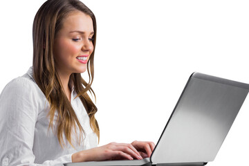 Businesswoman typing on her laptop