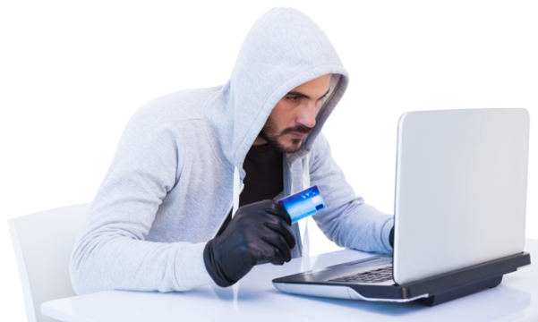 Burglar doing online shopping with laptop and credit card