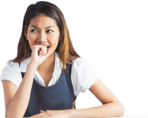 Businesswoman biting her fist