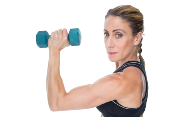 Portrait of woman holding dumbbells