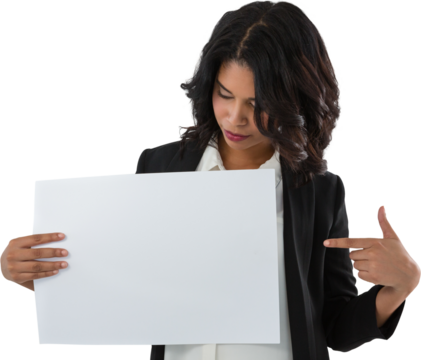 Businesswoman pointing at placard