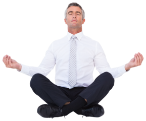 Zen businessman meditating in lotus pose 