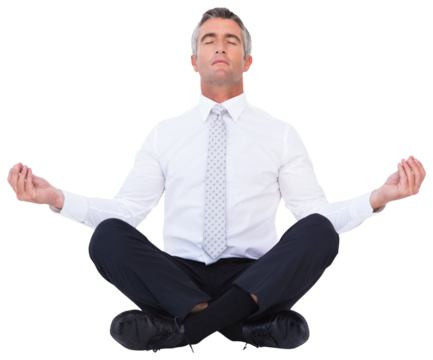 Zen businessman meditating in lotus pose 