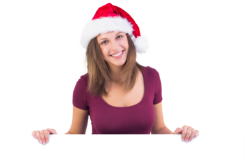 Festive brunette smiling at camera holding poster