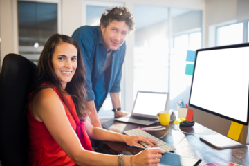 Business people working in office using technology