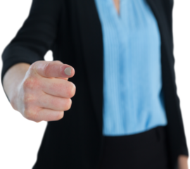 Mid section of businesswoman touching imaginary interface