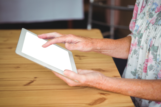 Senior woman using digital tablet