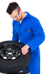 Mechanic working on tire 