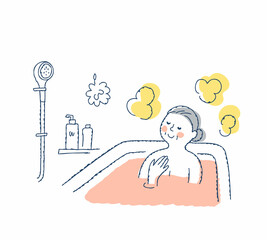 お風呂でリラックスするシニア女性