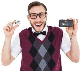 Geeky hipster holding a retro tape cassette player