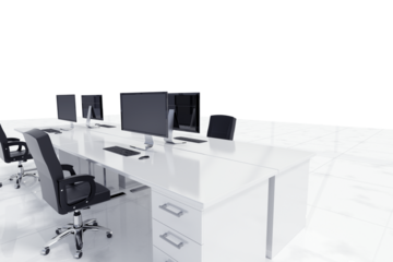 Empty chairs by computers on desk in office