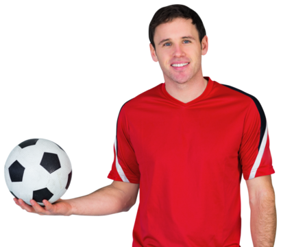 Football fan in red holding ball