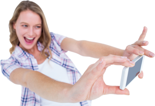 Pretty hipster taking selfie with smartphone