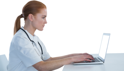 Side view of female doctor using laptop