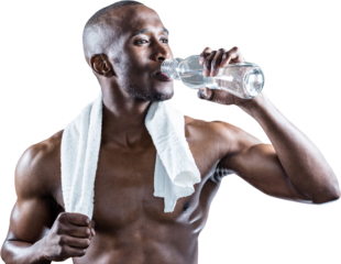 Athlete with towel around neck drinking water