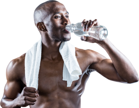 Athlete with towel around neck drinking water