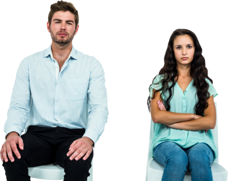 Couple sitting on chairs not talking after argument