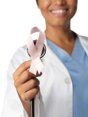 Breast cancer awareness pink ribbon on a stethoscope on white background