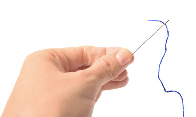 Woman holding sewing needle with thread on white background, closeup