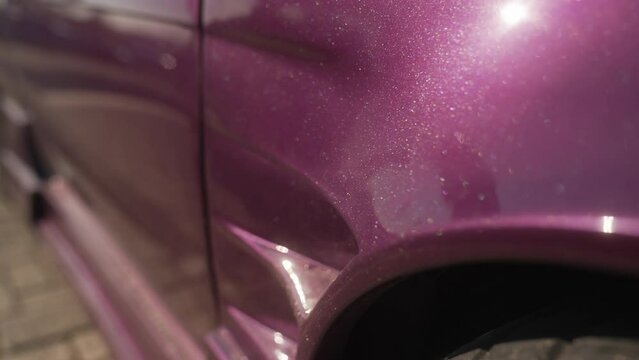 Purple sport car detial during sunny day in 4k