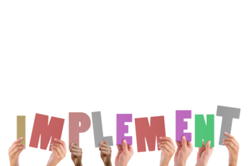 Colorful alphabet spelling implement held up by people 