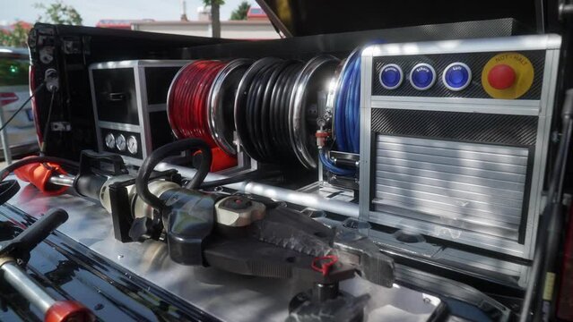 Modern firefighters rescue car pickup with firefighters equipment