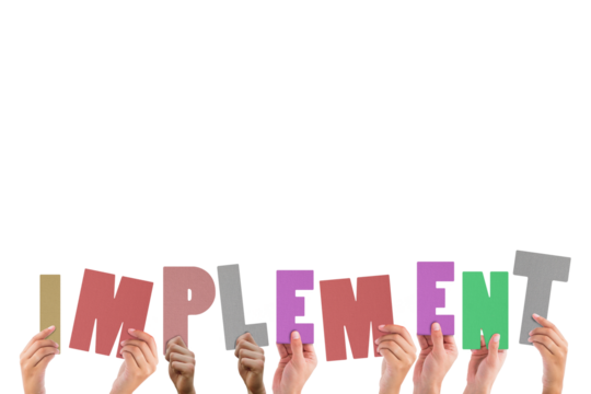 Colorful alphabet spelling implement held up by people 