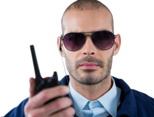 Portrait of security officer talking on walkie talkie