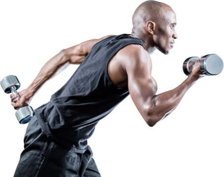 Muscular man running while holding dumbbell