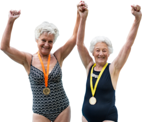 Portrait of smiling female swimmers with medals