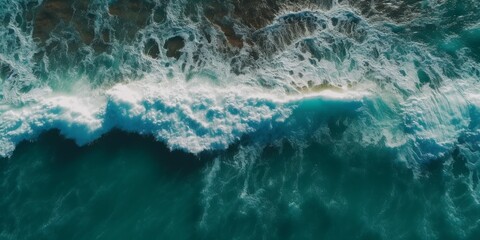 Fototapeta na wymiar Spectacular top view of tropical sea waves from drone