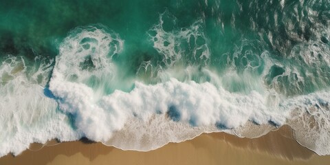Top-down aerial shot of splashing white waves in the ocean