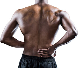 Fototapeta na wymiar Muscular athlete suffering through back pain