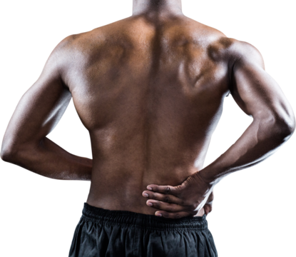 Muscular athlete suffering through back pain