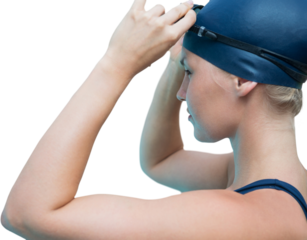 Side view of woman wearing swimming cap