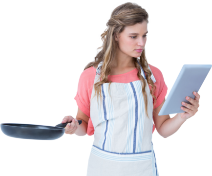 Happy hipster woman holding laptop and frying pan - Powered by Adobe