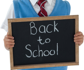Schoolboy holding slate with back to school text against white background