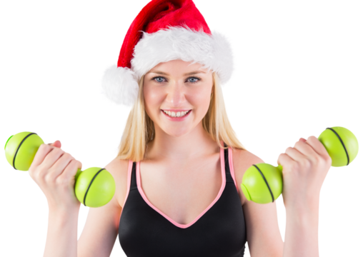 Festive fit blonde smiling at camera