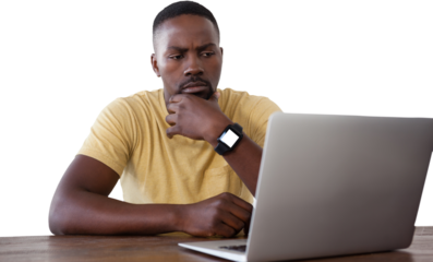 Thoughtful man looking into laptop