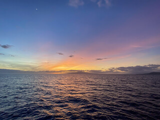 Colorful sunset over ocean water Maui