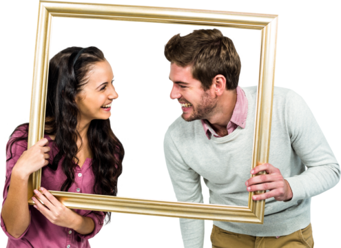 Stylish couple holding picture frame - Powered by Adobe