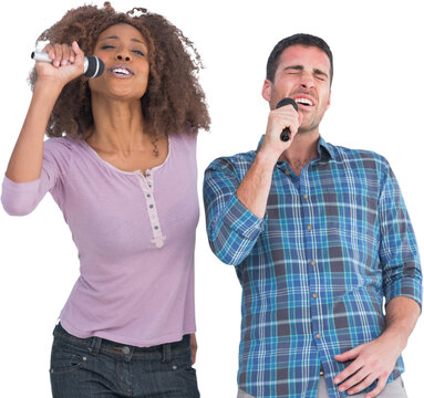 Fun pair singing at karaoke