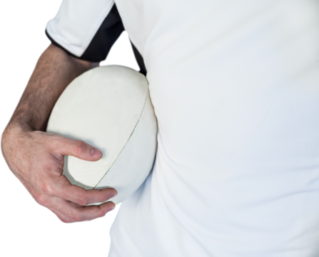 Midsection of player holding rugby ball