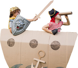 Fototapeta premium Boys in pirate costumes with artificial cardboard ship