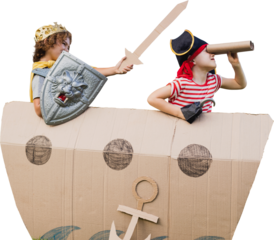Boys in pirate costumes with artificial cardboard ship
