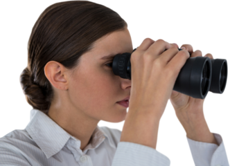 Close up of confident businesswoman looking through binoculars