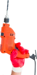 Rolgordijnen Hand with red gloves holding drill machine © vectorfusionart