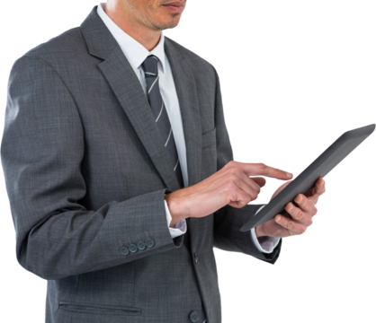 Midsection of sophisticated businessman using digital tablet